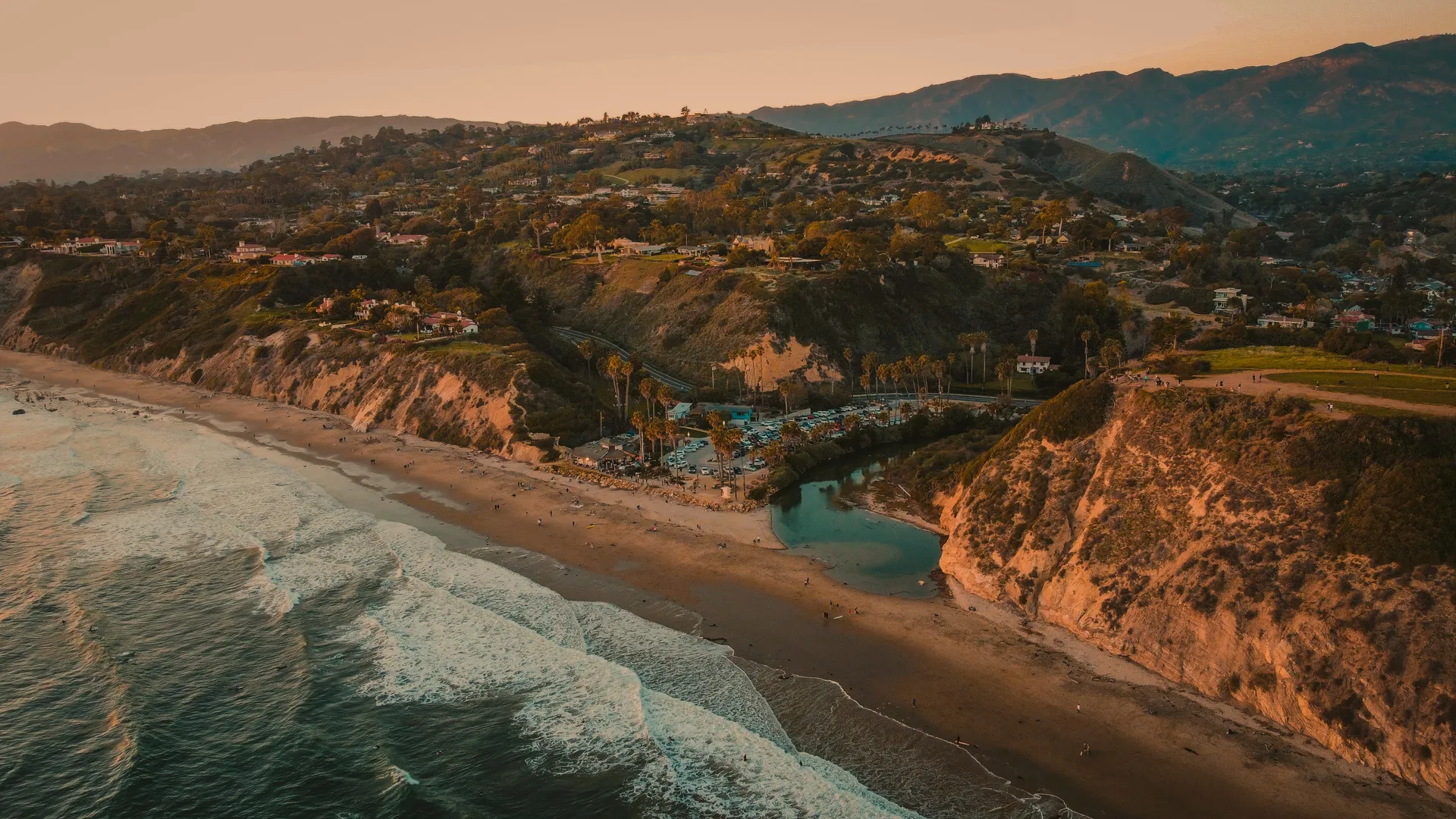 Aerial view of Hendry's Beach and the Santa Barbara foothills at golden hour